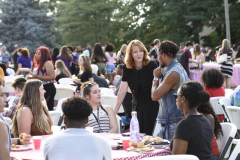 18 - August - President Trombley talks to students at the new students picnic